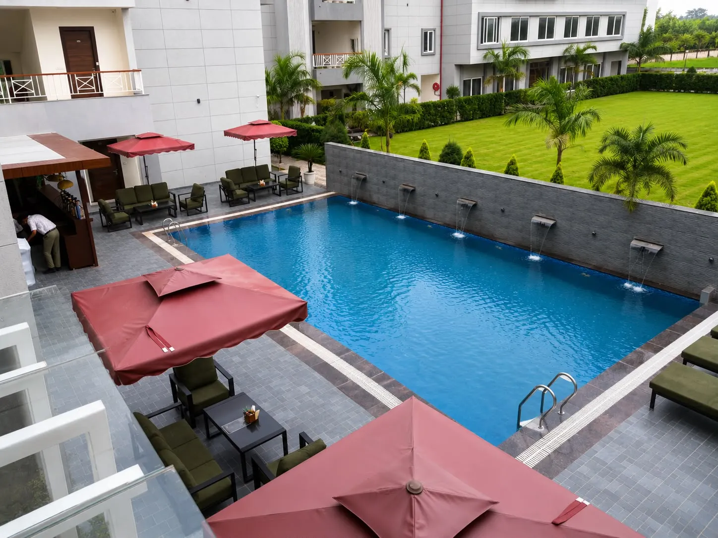 Savanna Retreat by Nuva Stayz — Pool and lawn